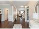Elegant foyer with hardwood floors, detailed trim, and a view of the living space at 875 Stratford Run Dr, Fort Mill, SC 29708