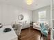 Comfortable home office with stylish decor, hardwood floors, and plenty of natural light at 875 Stratford Run Dr, Fort Mill, SC 29708