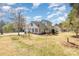 Backyard with basketball hoop and a well-manicured lawn in a suburban neighborhood at 919 42Nd Avenue Ne Ln, Hickory, NC 28601