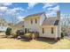 Two-story home with back deck, nice lawn, mature trees and a wooded backyard at 919 42Nd Avenue Ne Ln, Hickory, NC 28601