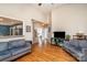 Open-concept living room with hardwood floors, neutral walls, and staircase at 919 42Nd Avenue Ne Ln, Hickory, NC 28601