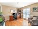 Home office with hardwood floors, a desk, bookcase, and chair near a window at 919 42Nd Avenue Ne Ln, Hickory, NC 28601