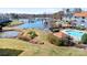 Scenic aerial view showcasing the community's pool, marina, and waterfront location on Lake Norman at 1107 Torrence Cir, Davidson, NC 28036