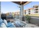 Relaxing outdoor balcony featuring comfortable seating and views of the surrounding community at 1107 Torrence Cir, Davidson, NC 28036