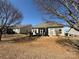 A cozy backyard featuring a screened porch, a well-kept lawn, and ample space for outdoor relaxation and entertainment at 1116 Black Walnut Rd, Clover, SC 29710