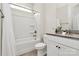 Clean bathroom features granite countertop, vanity with ample storage, and a shower-tub combination for versatile use at 2408 Napa Ter, Clover, SC 29710