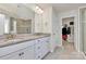 Bathroom with double vanity, granite countertops, and a glass-enclosed shower and view of closet at 2408 Napa Ter, Clover, SC 29710
