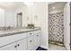 Bathroom featuring a double vanity with granite countertops, and a shower with a themed curtain at 2408 Napa Ter, Clover, SC 29710