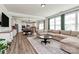 Open-concept living room seamlessly connects to the kitchen and dining area, perfect for entertaining at 2408 Napa Ter, Clover, SC 29710