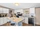 Bright kitchen with a center island and stool seating provides an open and inviting space for cooking and gathering at 255 Liberty Estates Ln, Taylorsville, NC 28681