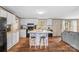 Modern kitchen featuring white cabinets, a stylish island, and new appliances, ideal for cooking and entertaining at 255 Liberty Estates Ln, Taylorsville, NC 28681