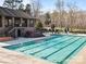Exterior shot of a community pool with lap lanes and a pool house at 6816 Charter Hills Rd, Charlotte, NC 28277