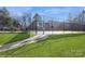 Gated community tennis courts featuring well-maintained courts and lush green surroundings at 6816 Charter Hills Rd, Charlotte, NC 28277
