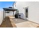 Backyard featuring a gazebo, a grill, a concrete patio, and an access door to the home at 838 Foxglove Ln, York, SC 29745