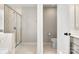 The bright ensuite bathroom features a tiled stand-up shower with glass door and a toilet at 838 Foxglove Ln, York, SC 29745