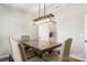 Bright dining room showcasing a large wooden table, seating for six, and recessed lighting at 838 Foxglove Ln, York, SC 29745