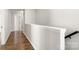 Hallway with hardwood flooring, offering a glimpse into other areas of the home at 838 Foxglove Ln, York, SC 29745