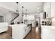 Bright kitchen with stainless steel appliances, white cabinetry, pendant lighting, and a large island with seating at 838 Foxglove Ln, York, SC 29745