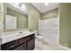 A full bathroom with a vanity, sink, mirror, toilet, and shower with a tub is available at 10159 Lakeshore Dr, Lancaster, SC 29720