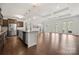 Spacious open concept kitchen and living area with lots of natural light, and hardwood flooring at 10159 Lakeshore Dr, Lancaster, SC 29720