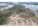 An aerial shot of a neighborhood showcases community boat launch near Lake Norman homes at 107 Hillside Cove Ct, Mooresville, NC 28117