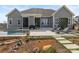 Backyard oasis featuring a pool, patio, lounge chairs, and well-maintained landscaping at 107 Hillside Cove Ct, Mooresville, NC 28117