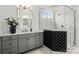 Modern bathroom features a glass shower enclosure, sleek vanity, and stylish design at 107 Hillside Cove Ct, Mooresville, NC 28117