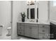Elegant bathroom with gray vanity, quartz counters, and modern fixtures at 107 Hillside Cove Ct, Mooresville, NC 28117