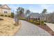 Charming home with manicured front yard, mature trees, and private drive at 107 Hillside Cove Ct, Mooresville, NC 28117