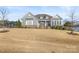 Charming single-story home with stone accents, gray siding, and a well-manicured lawn at 107 Hillside Cove Ct, Mooresville, NC 28117