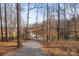 Scenic path leading to private lake access with serene views at 107 Hillside Cove Ct, Mooresville, NC 28117