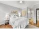 Cozy bedroom with hardwood floors, natural light, and stylish decor, for a relaxing retreat at 1121 Park West Dr, Charlotte, NC 28209