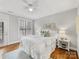Serene bedroom with a plush bed, natural light, and hardwood floors at 1121 Park West Dr, Charlotte, NC 28209