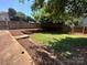 Backyard with fence and mature trees at 115 6Th Ne Ave, Hickory, NC 28601