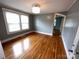 Spacious living room with natural light, hardwood floors and gray walls at 115 6Th Ne Ave, Hickory, NC 28601