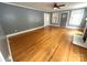 Spacious living room featuring hardwood floors, a fireplace, and abundant natural light at 115 6Th Ne Ave, Hickory, NC 28601