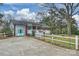 Charming home with a fenced yard and a side entrance to the garage, providing ample parking at 117 Maple Hill Rd, Monroe, NC 28110