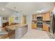 Modern kitchen with stainless steel island and stainless steel appliances at 117 Maple Hill Rd, Monroe, NC 28110
