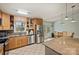 Well-equipped kitchen with stainless steel appliances and room for a dining table at 117 Maple Hill Rd, Monroe, NC 28110