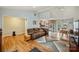 Open living room with hardwood floors and easy access to the kitchen at 117 Maple Hill Rd, Monroe, NC 28110