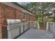 Outdoor kitchen featuring a stainless steel grill and ample counter space, perfect for entertaining guests at 117 Maple Hill Rd, Monroe, NC 28110