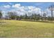 Open field under a blue sky offering lots of space at 117 Maple Hill Rd, Monroe, NC 28110
