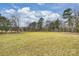 Spacious yard showcasing lots of space and green grass at 117 Maple Hill Rd, Monroe, NC 28110