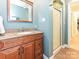Updated bathroom featuring granite counters on vanity, shower, and tile flooring at 124 Canterbury Ln, Matthews, NC 28104