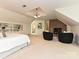 Comfortable bedroom featuring a custom bookcase wall, brick fireplace, and neutral decor, perfect for relaxation and rest at 124 Canterbury Ln, Matthews, NC 28104