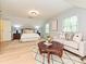Well-decorated primary bedroom featuring a seating area, and lots of natural light at 124 Canterbury Ln, Matthews, NC 28104