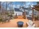 Large deck features multiple seating areas, a hot tub, and a fire pit, perfect for entertaining at 125 High Sail Ct, Mooresville, NC 28117