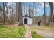 Backyard shed with a brick pathway at 125 High Sail Ct, Mooresville, NC 28117
