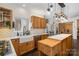 Spacious kitchen features modern appliances, white tile backsplash, and ample counter space at 125 High Sail Ct, Mooresville, NC 28117