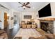 Open-concept living room with fireplace that is great for relaxing and entertaining at 125 High Sail Ct, Mooresville, NC 28117